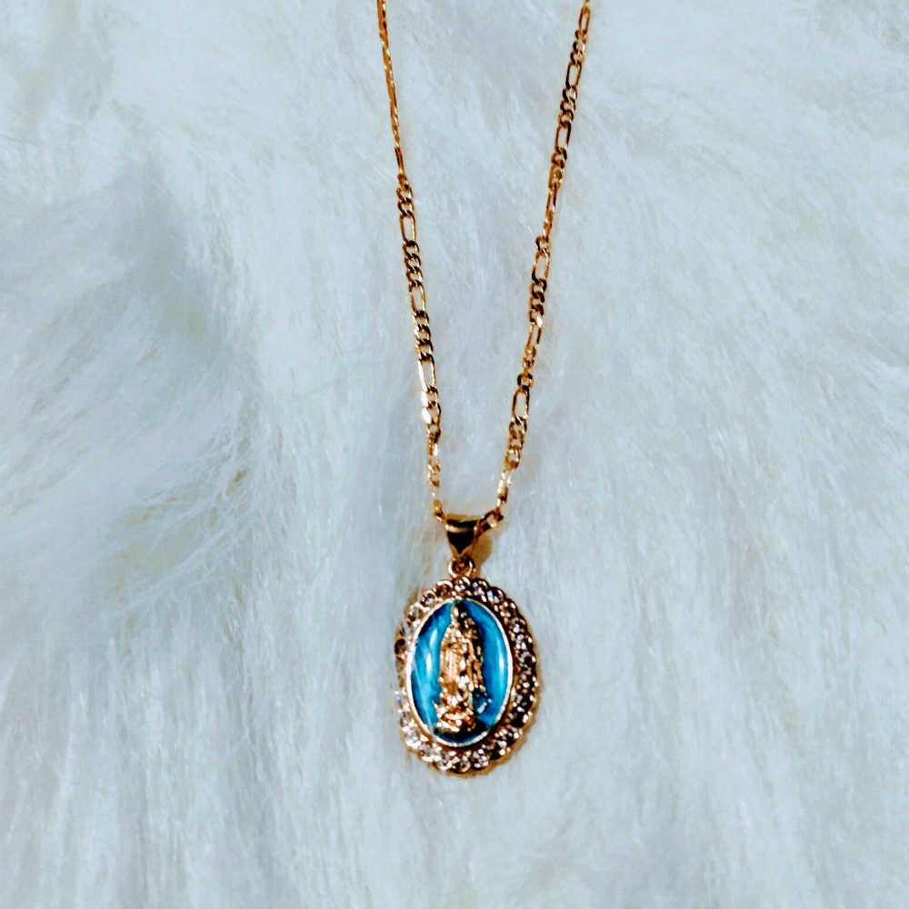NWT goldstone Virgin Mary necklace. Gold chain with gold & blue pendant